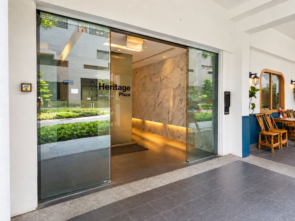 Glass entrance doors of Heritage Place on the ground floor